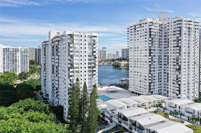 view of building exterior with a water view