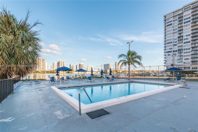 view of pool featuring a patio area