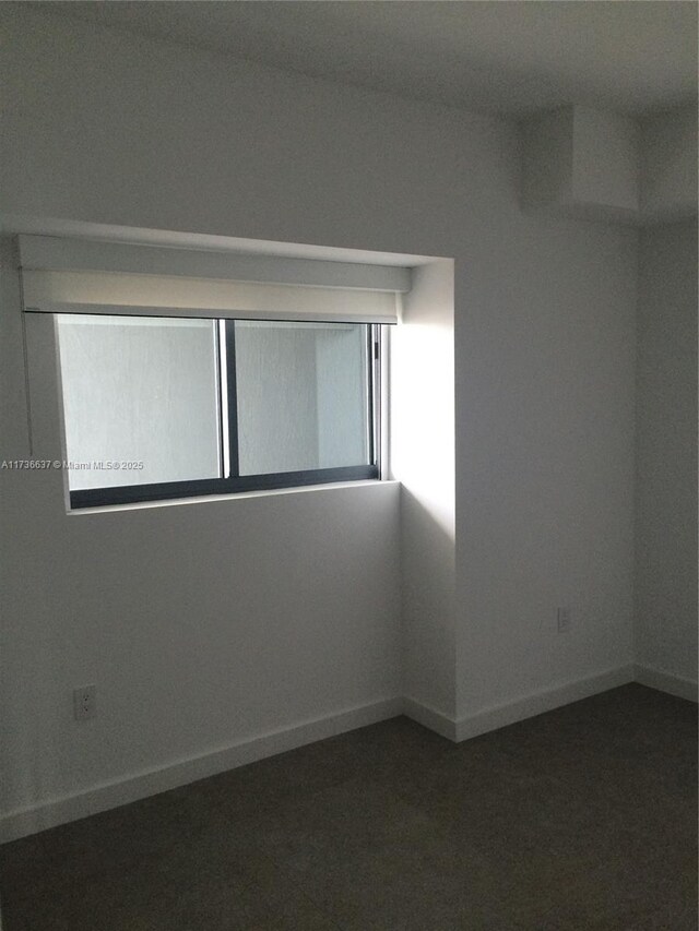 460 NE 28th St Unit 2503, Miami, FL 33137 - spare room featuring baseboards