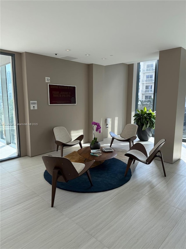 460 NE 28th St Unit 2503, Miami, FL 33137 - sitting room with expansive windows and healthy amount of natural light