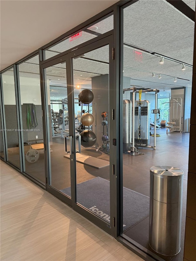 exercise room with expansive windows