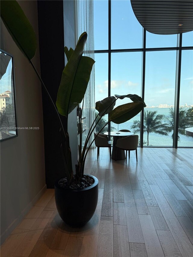 460 NE 28th St Unit 2503, Miami, FL 33137 - interior space with wood finished floors and baseboards