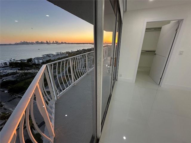 balcony featuring a water view