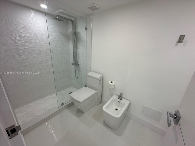bathroom featuring a walk in shower, tile patterned flooring, toilet, and a bidet