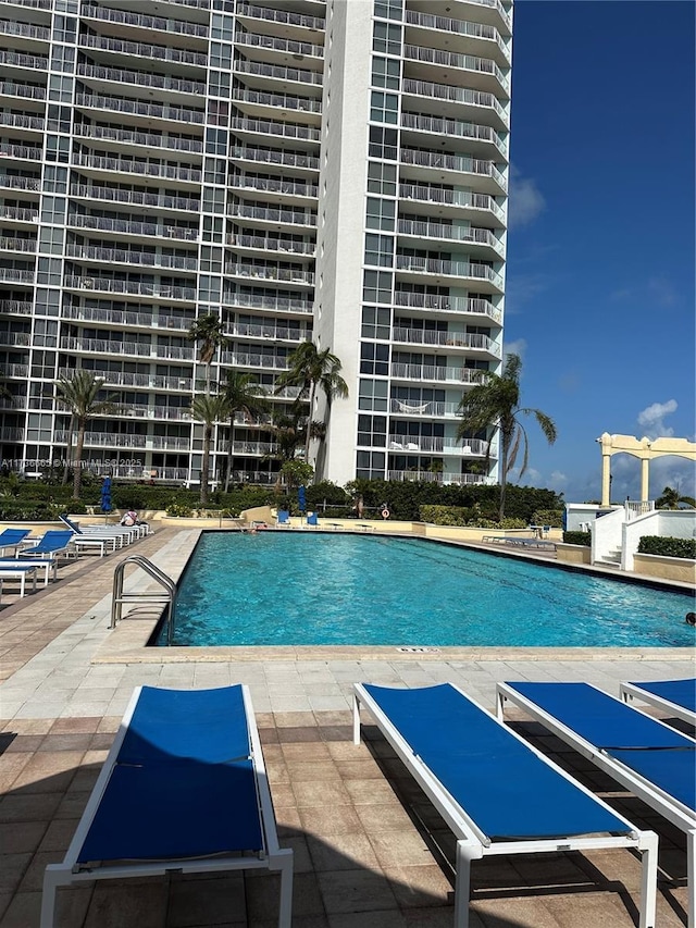 pool with a patio area