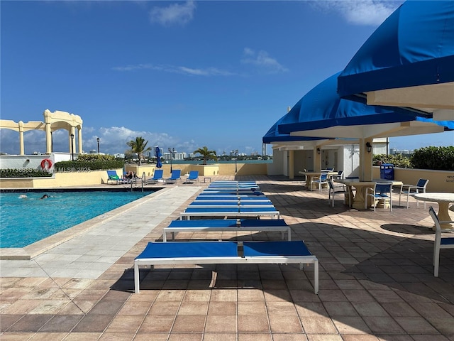 community pool with a patio