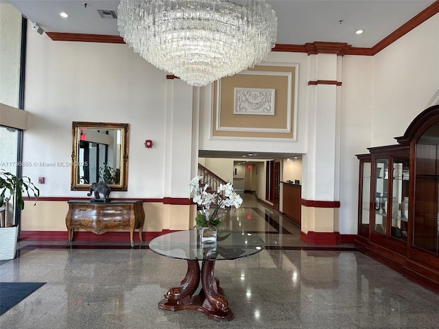 lobby with visible vents and stairway