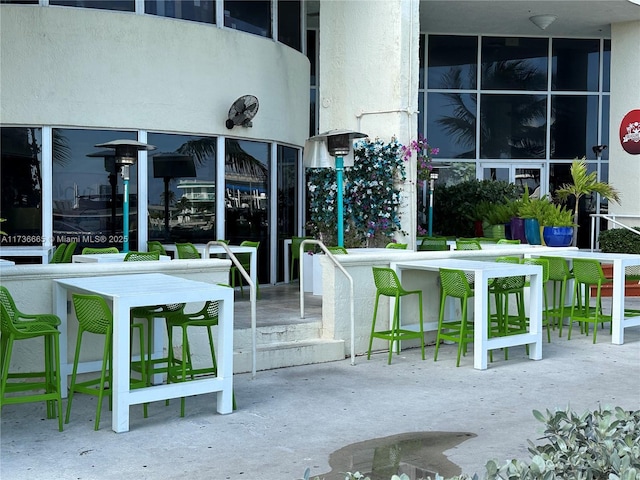 view of property's community featuring outdoor dry bar
