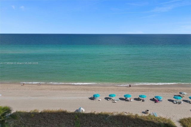 view of water feature with a beach view