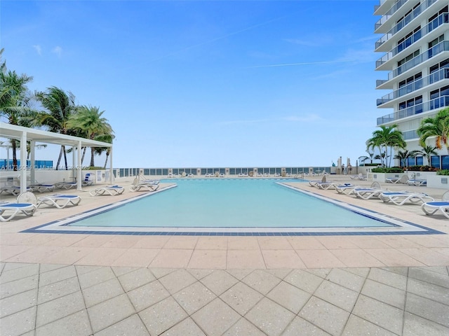 view of pool featuring a patio area