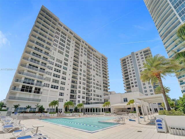 view of pool featuring a patio area and a pergola