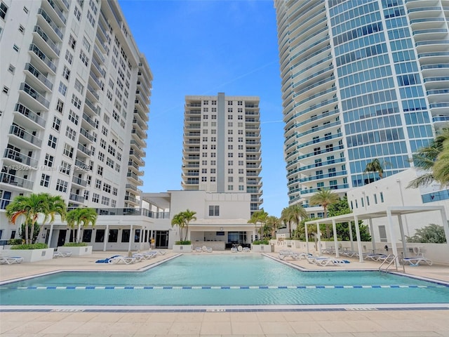 view of swimming pool with a patio