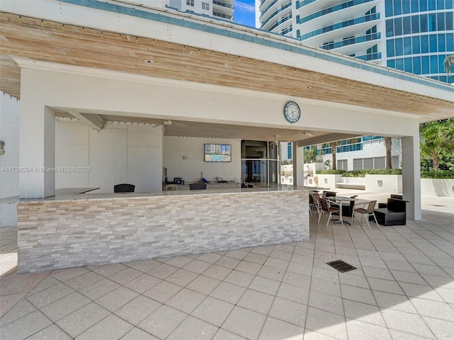 view of patio / terrace with an outdoor bar