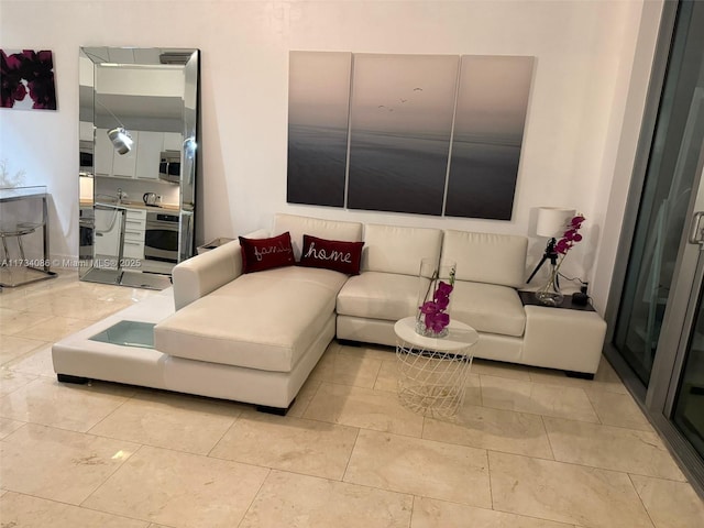 living room featuring light tile patterned floors