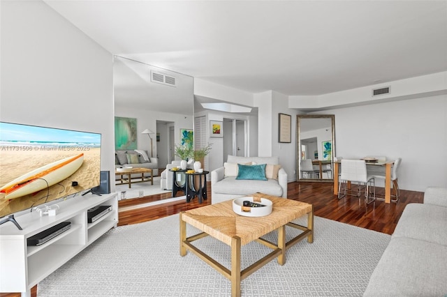 living room with hardwood / wood-style floors