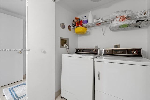 laundry area featuring washer and clothes dryer