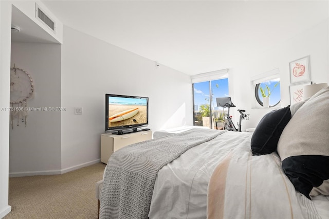 bedroom with light carpet