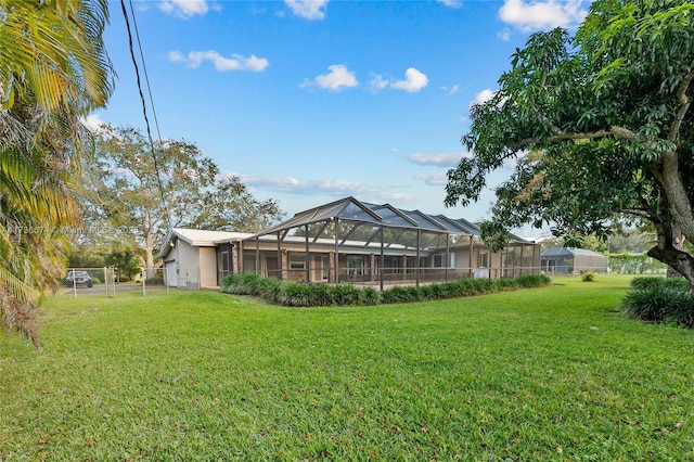 view of yard featuring glass enclosure