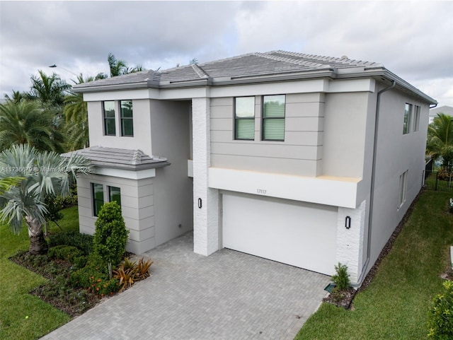 view of front of property featuring a garage