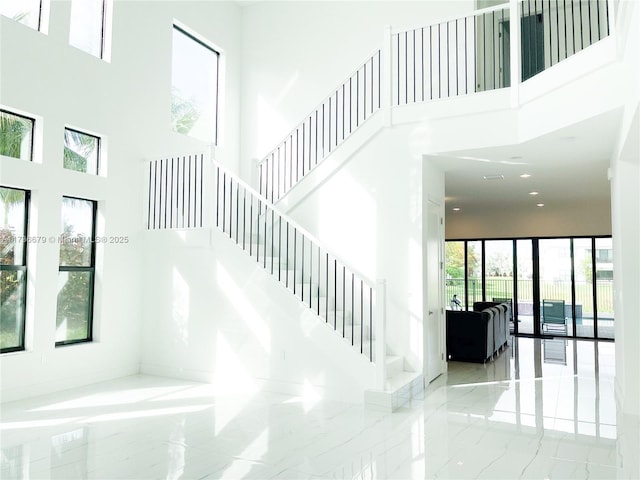 stairs with a towering ceiling