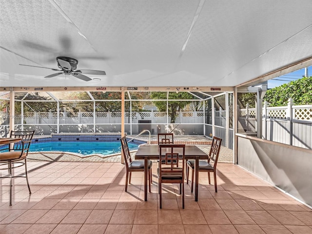 exterior space featuring a ceiling fan