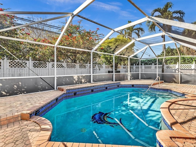 view of pool featuring a fenced in pool, a lanai, a fenced backyard, and a patio