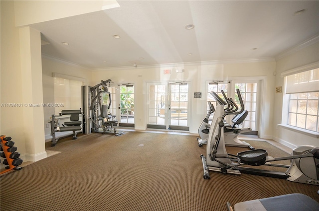 workout area with crown molding, carpet flooring, and french doors