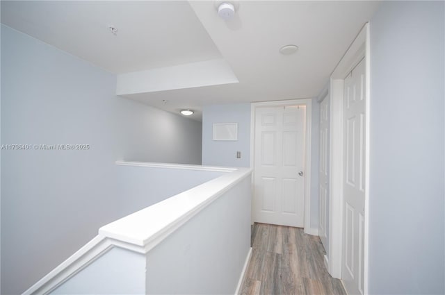 hallway featuring hardwood / wood-style flooring