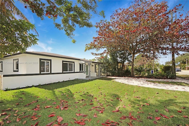 exterior space with a front lawn