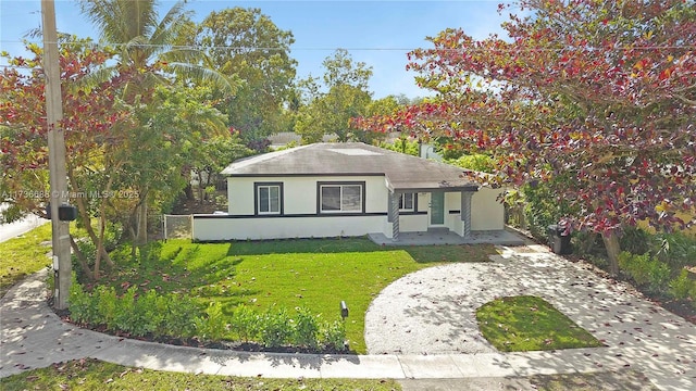 view of front of home with a front yard