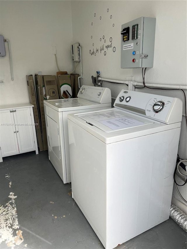 laundry area with laundry area and separate washer and dryer