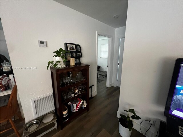 living room with dark wood-type flooring