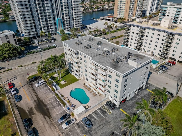 birds eye view of property featuring a water view