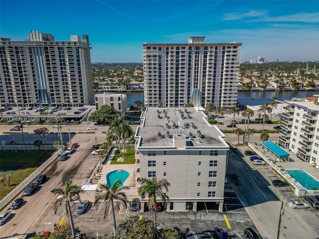 birds eye view of property featuring a water view