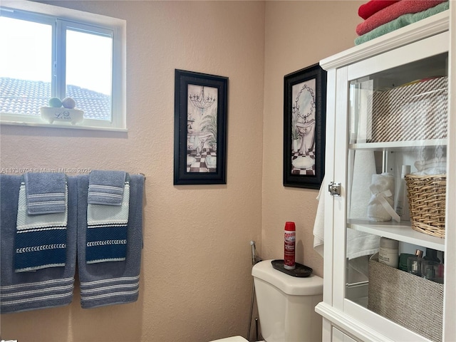 bathroom featuring toilet