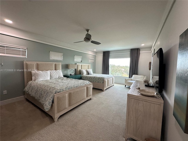 bedroom with light colored carpet and ceiling fan