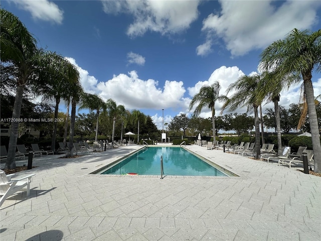 view of swimming pool featuring a patio