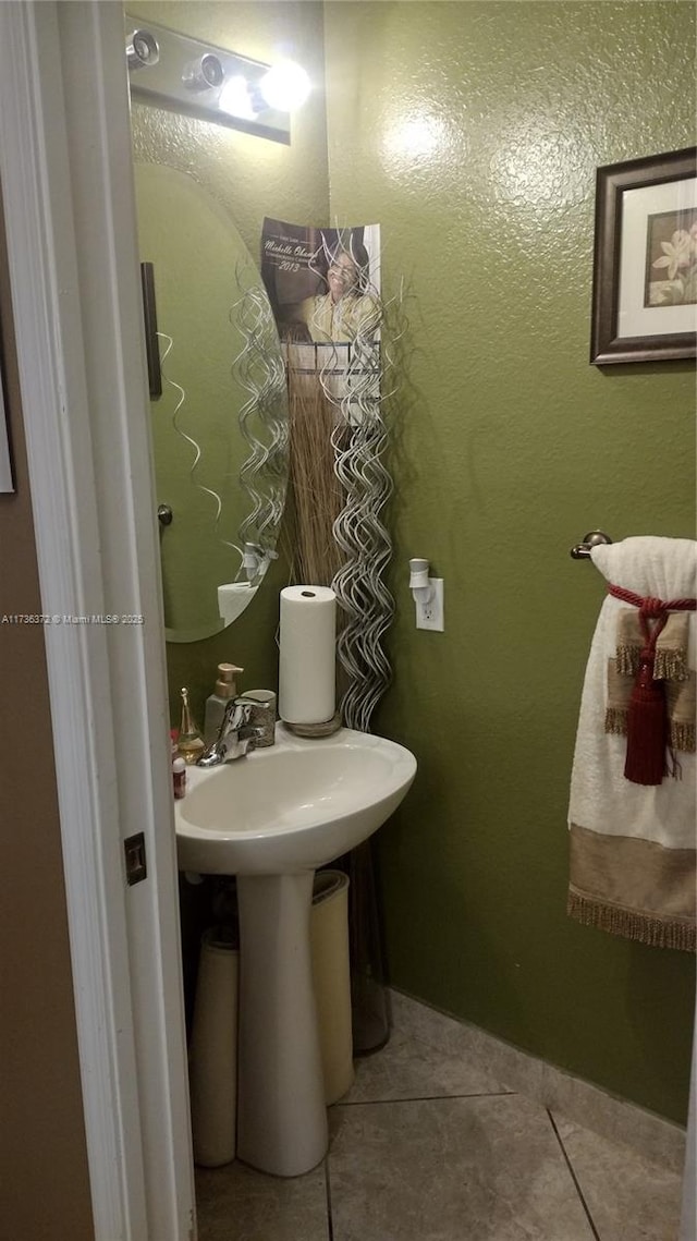 bathroom with tile patterned flooring