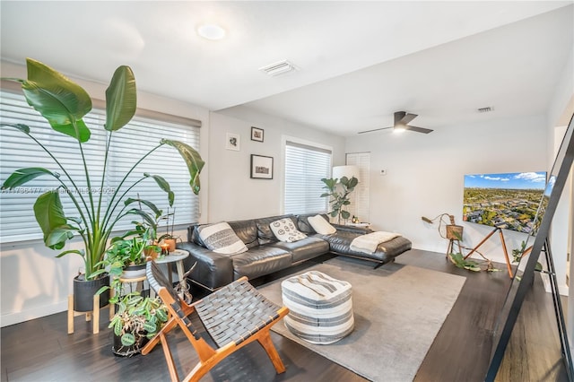 1091 NE 36th St, Oakland Park, FL 33334 - living room with ceiling fan, dark wood-type flooring, visible vents, and baseboards