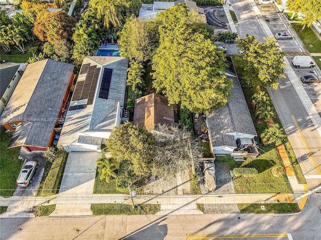 birds eye view of property with a residential view