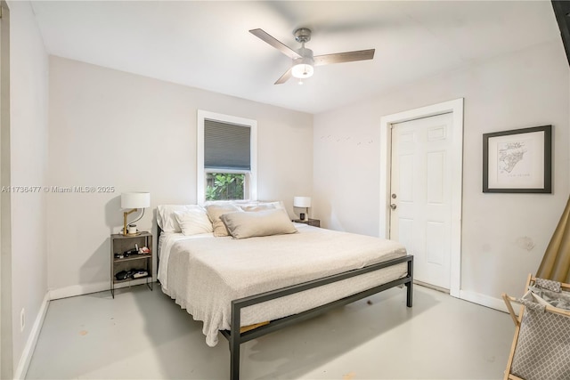 bedroom featuring concrete floors and ceiling fan