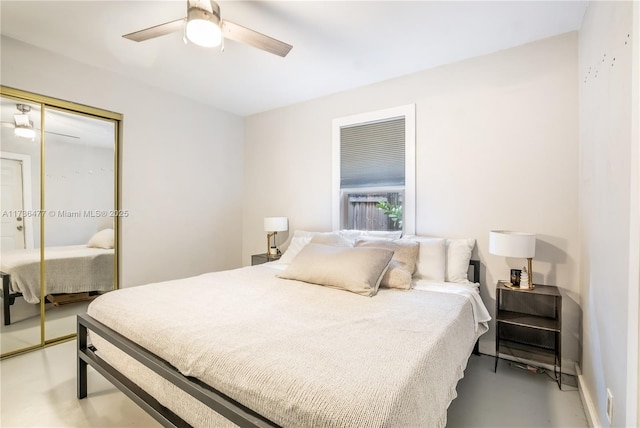 bedroom featuring a closet and a ceiling fan