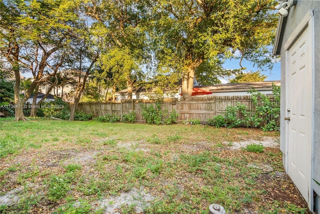 view of yard with a fenced backyard