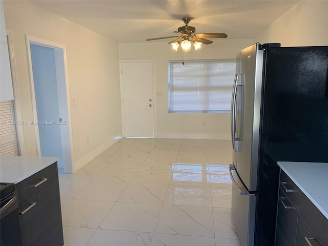 kitchen with ceiling fan, stainless steel refrigerator, and black / electric stove