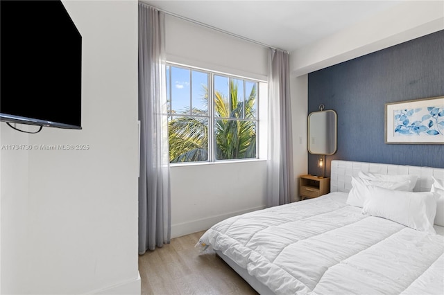 bedroom featuring light hardwood / wood-style flooring