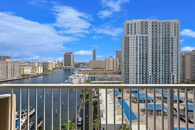 balcony featuring a water view