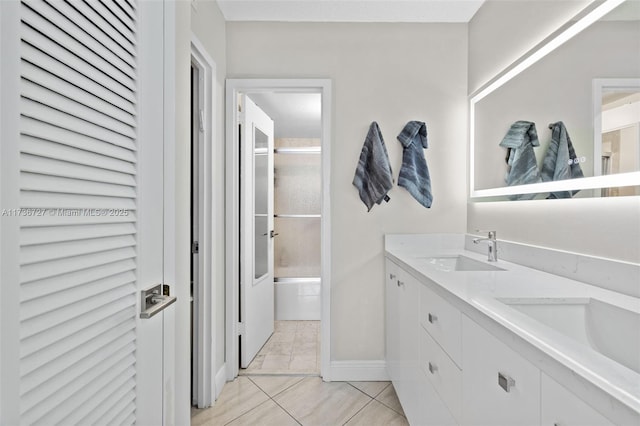 bathroom with vanity and separate shower and tub