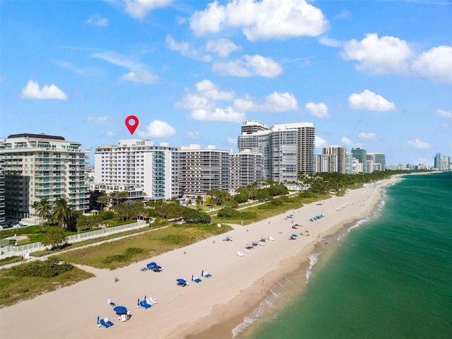 aerial view with a view of the beach and a water view