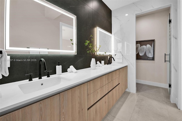 bathroom with vanity, tile patterned floors, and decorative backsplash