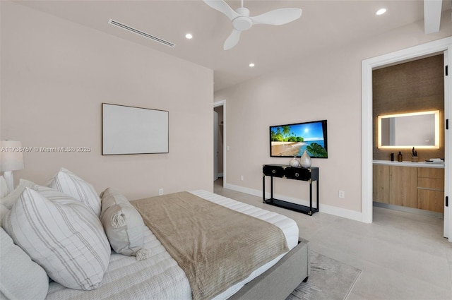 bedroom with ceiling fan and ensuite bath